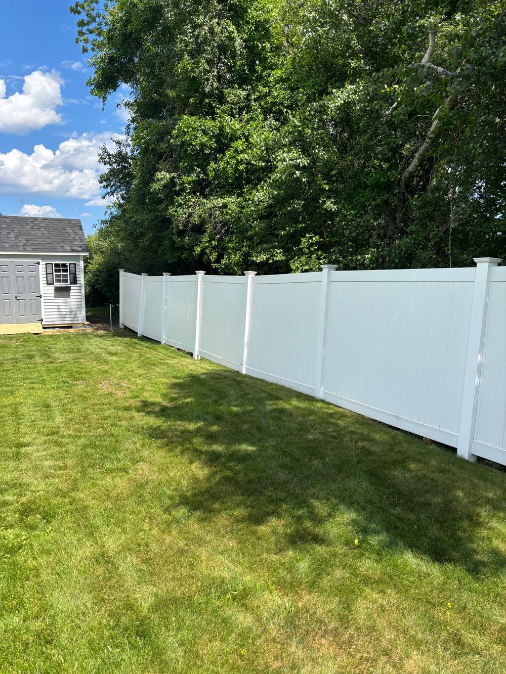 Vinyl fence after pressure washing
